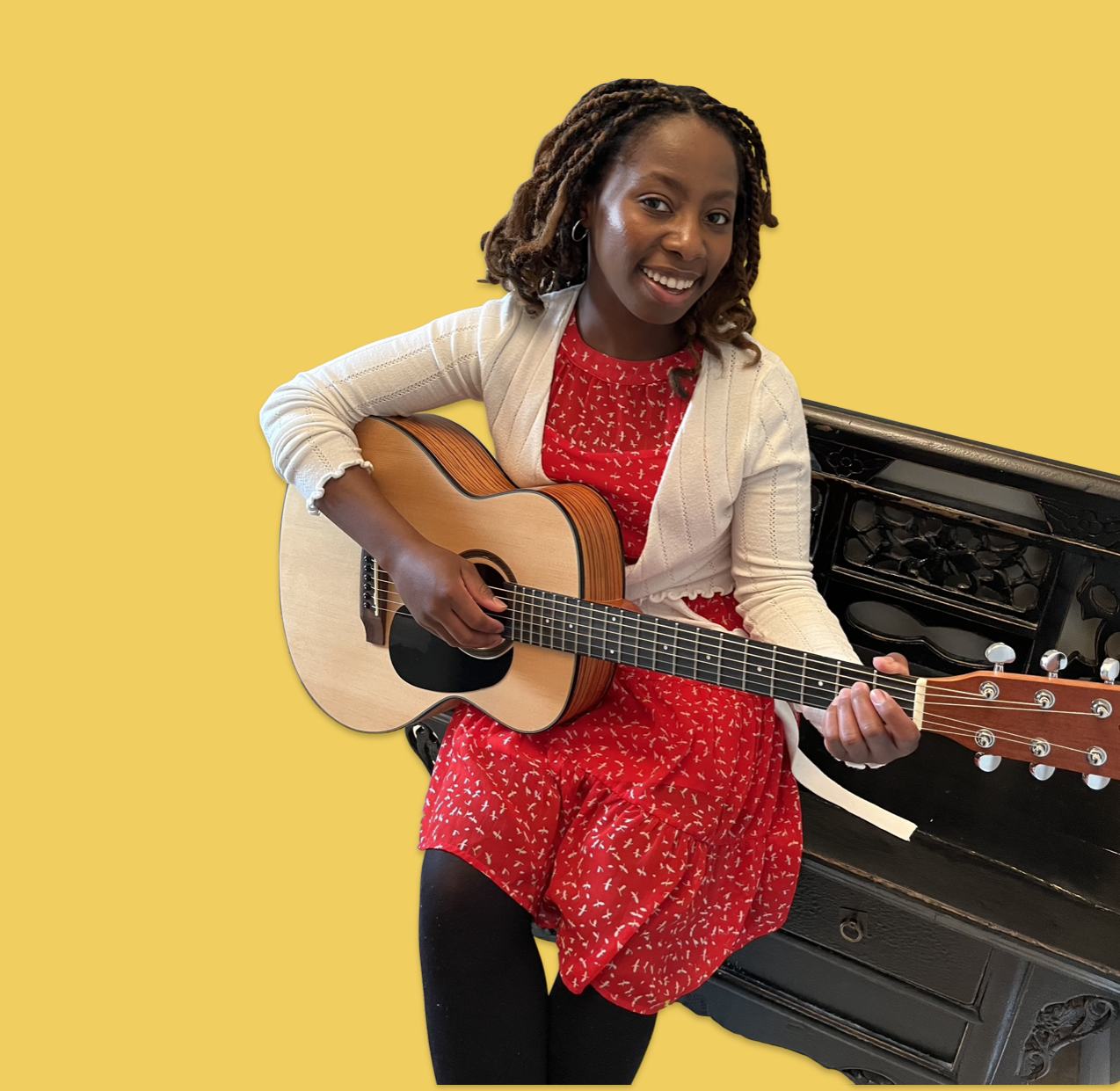 Miss Kemi with guitar